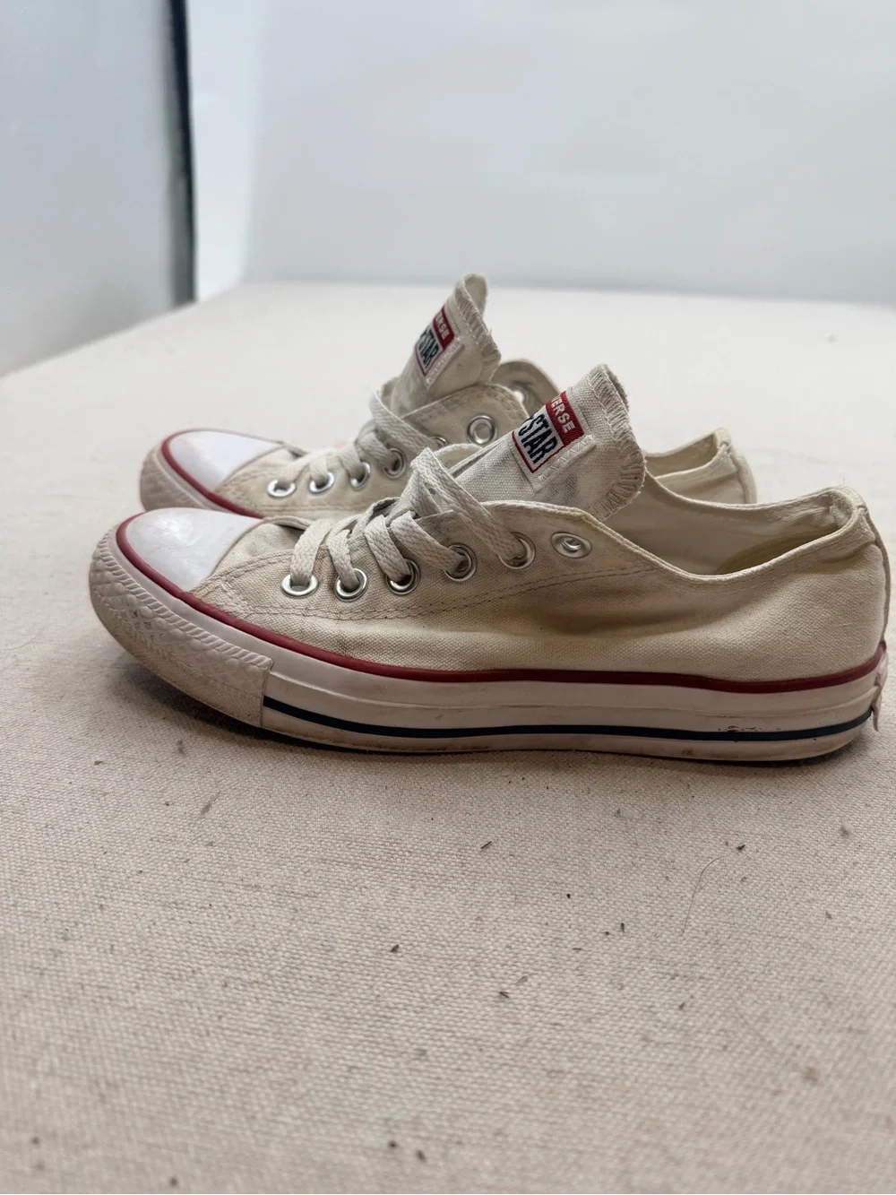 Converse White Low Top Sneakers with Red Trim